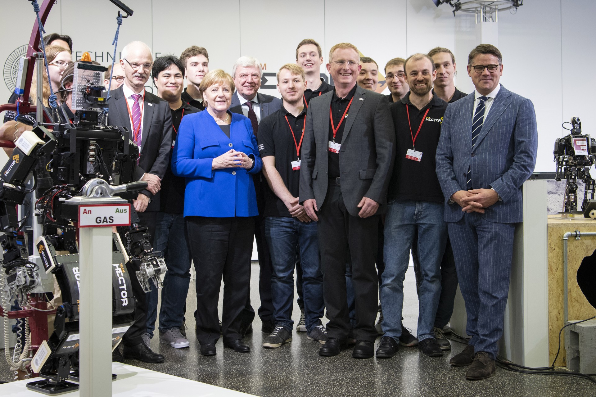 Press Photo of Team Hector with former German chancellor Angela Merkel.